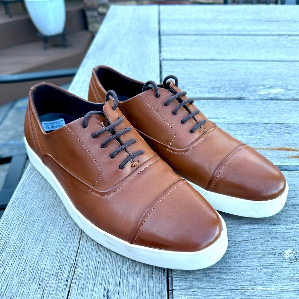 Men’s shoes worn once. Purchased the wrong size.